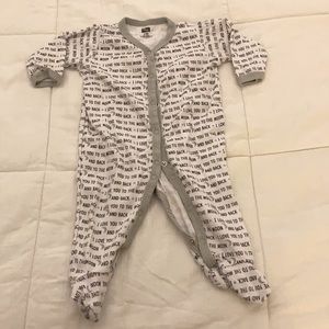Infant footie pajamas with snap closure